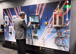 Photo of Dr. Al-Senayyid working with the CyberHive