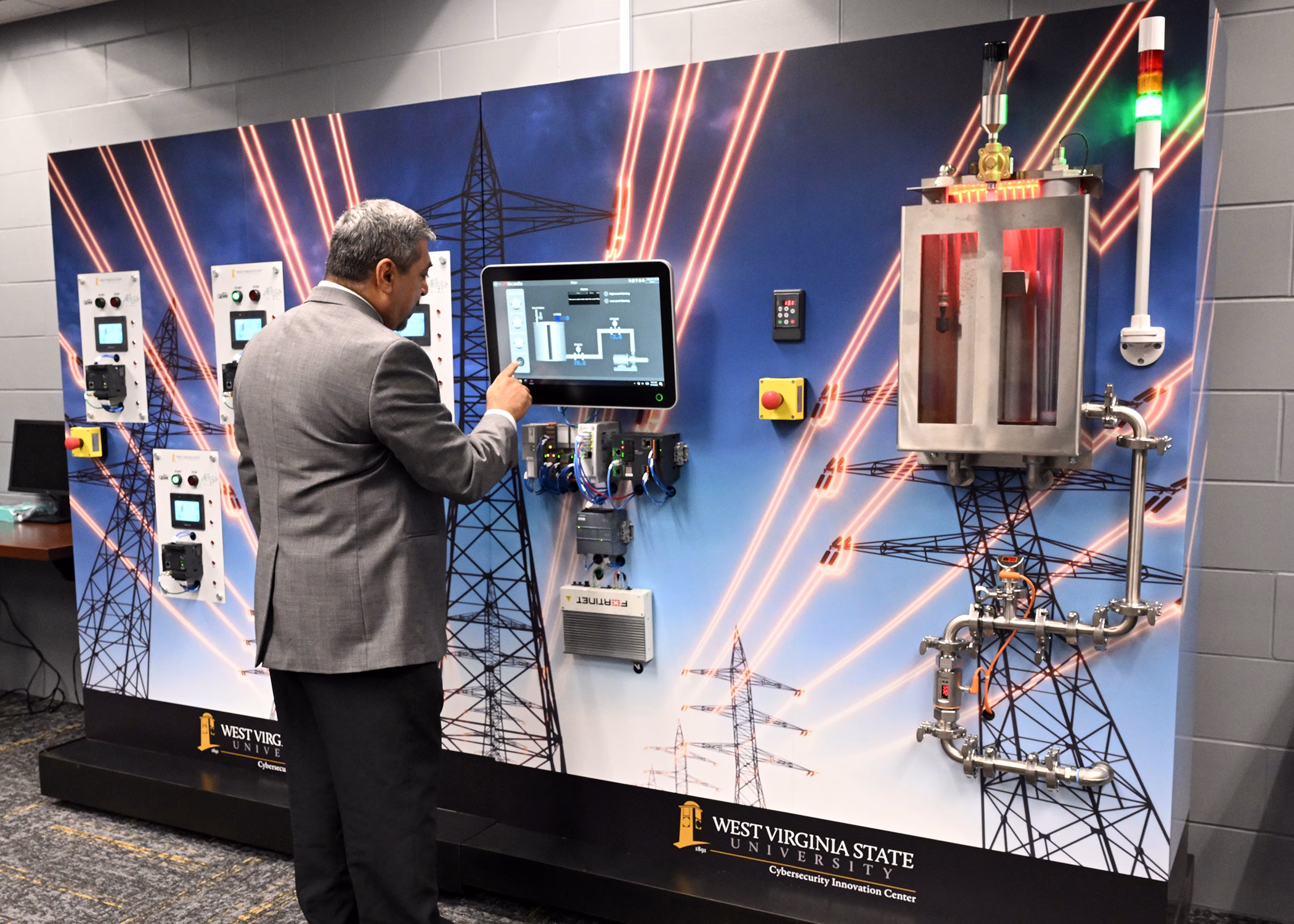 Photo of Dr. Al-Senayyid working with the CyberHive
