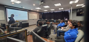 Photo of students participating in a YellowH@ckets design review session