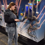 Photo of a female student working with the CyberHive