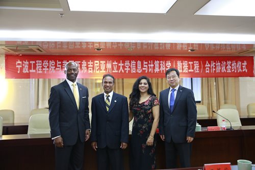 Former WVSU president, Dr. Anthony Jenkins, and former WVSU provost, Dr. Kumara Jayasuriya, with NBUT president and provost in China.