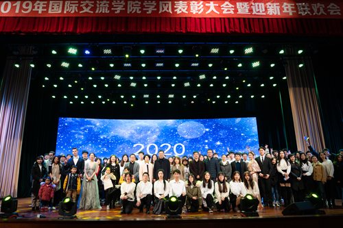 NBUT students and faculty on stage in 2020.