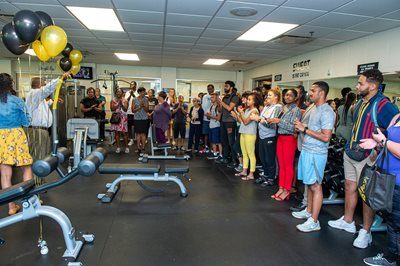 Students celebrate the grand reopening of the university finess center.