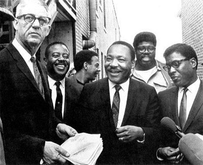 Martin Luther King Jr. with sanitation workers.