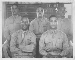 Black and white photo of the first Tuskegee pilots